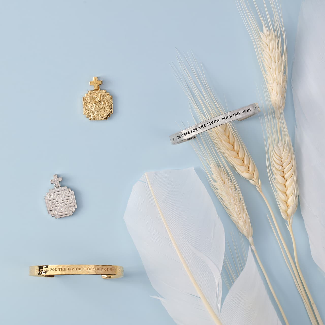 white buffalo woman jewelry with wheat and feathers